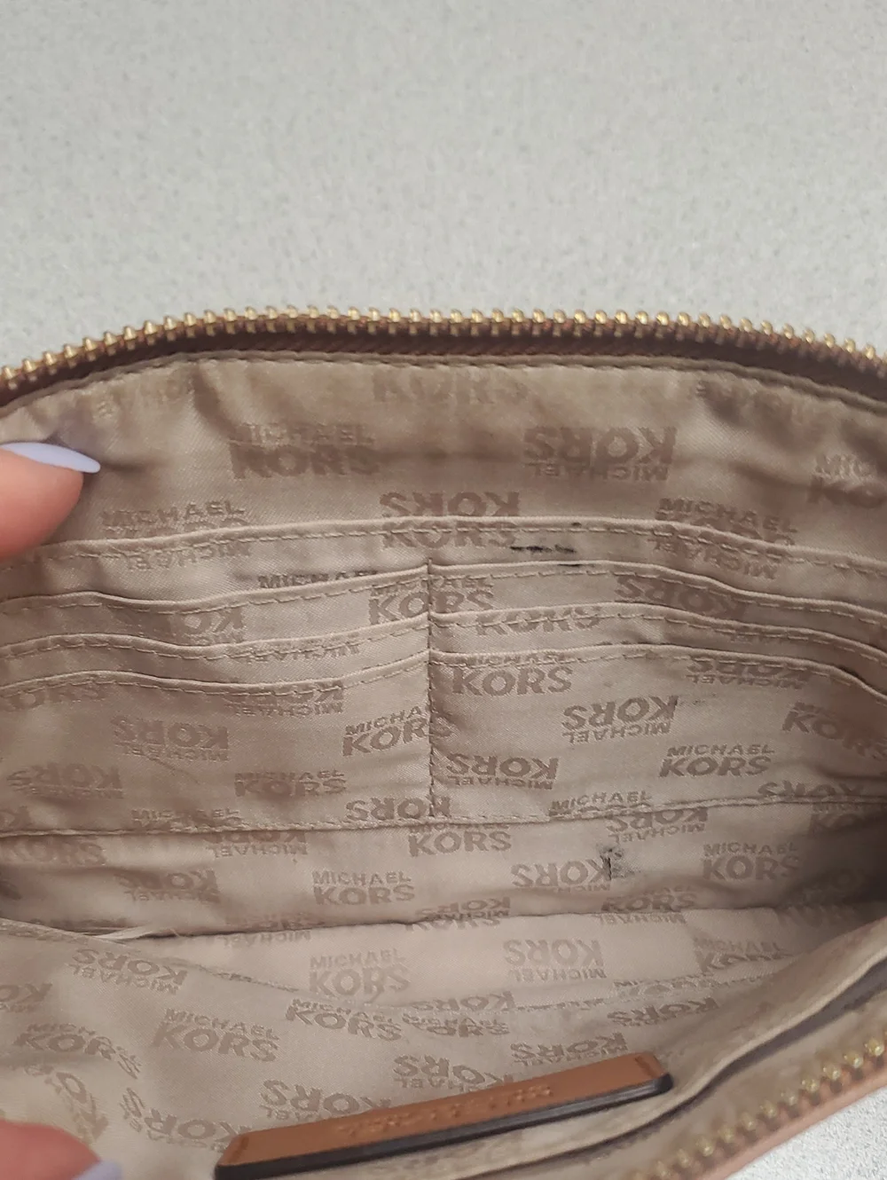 Michael Kors Dark Brown Perforated Zip Clutch with Tan Trim
